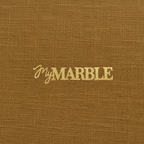Achterkant van My Marble onderzetter met My Marble logo