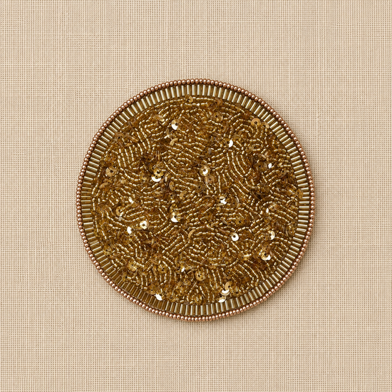 Handgemaakte Scale kralen onderzetter van My Marble paillet goud